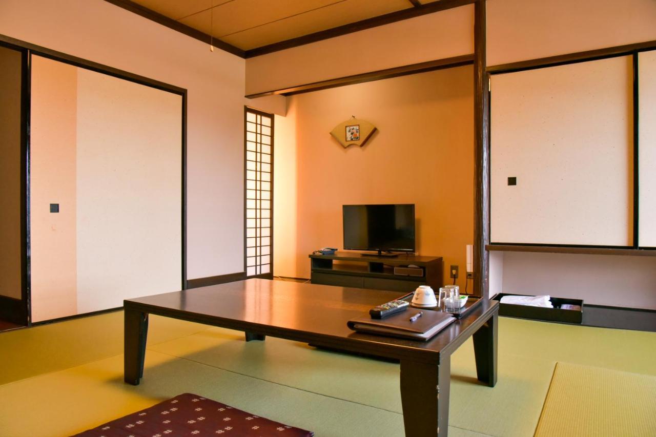 Aso Hotel Bagian luar foto