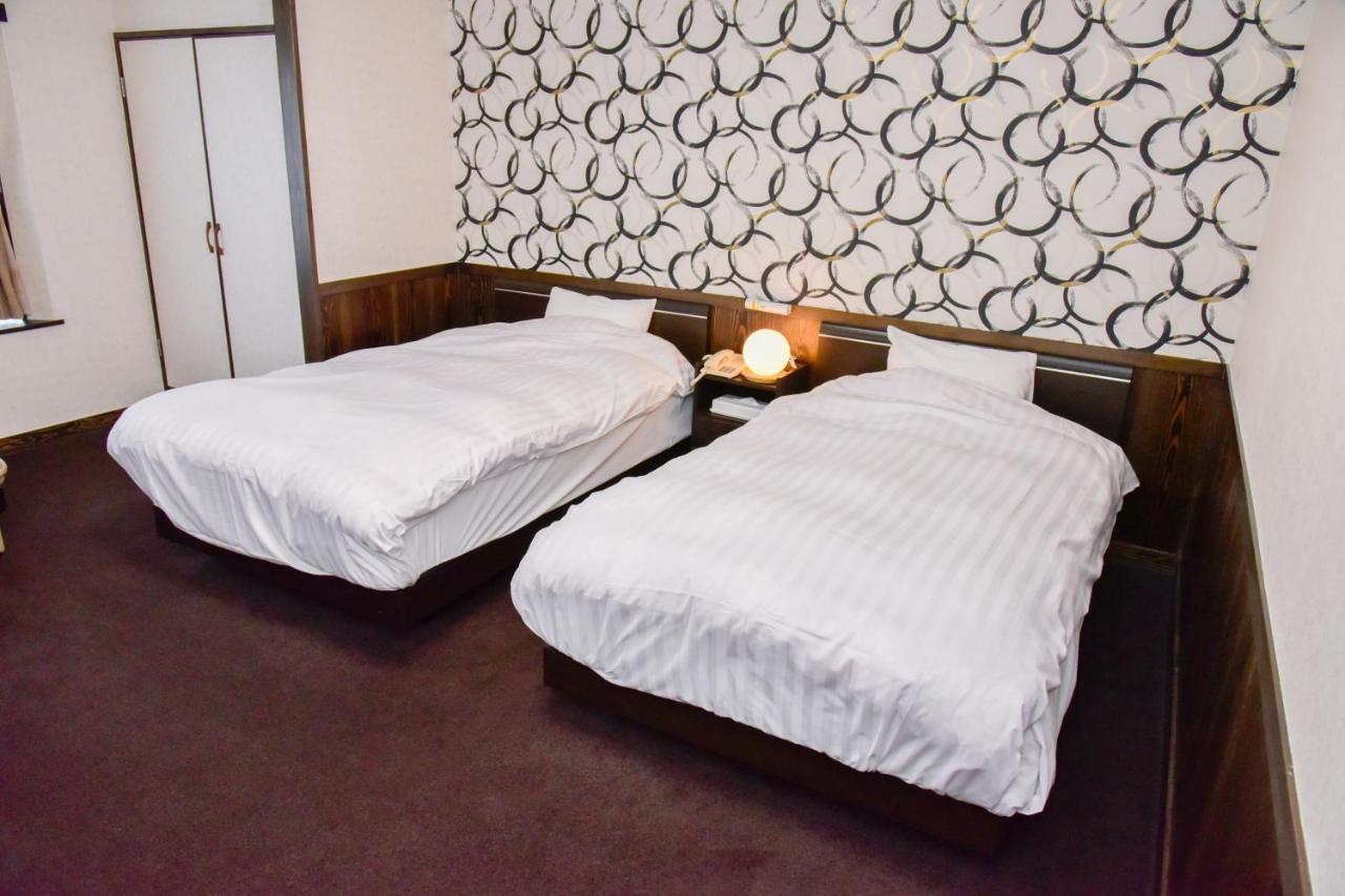 Aso Hotel Bagian luar foto