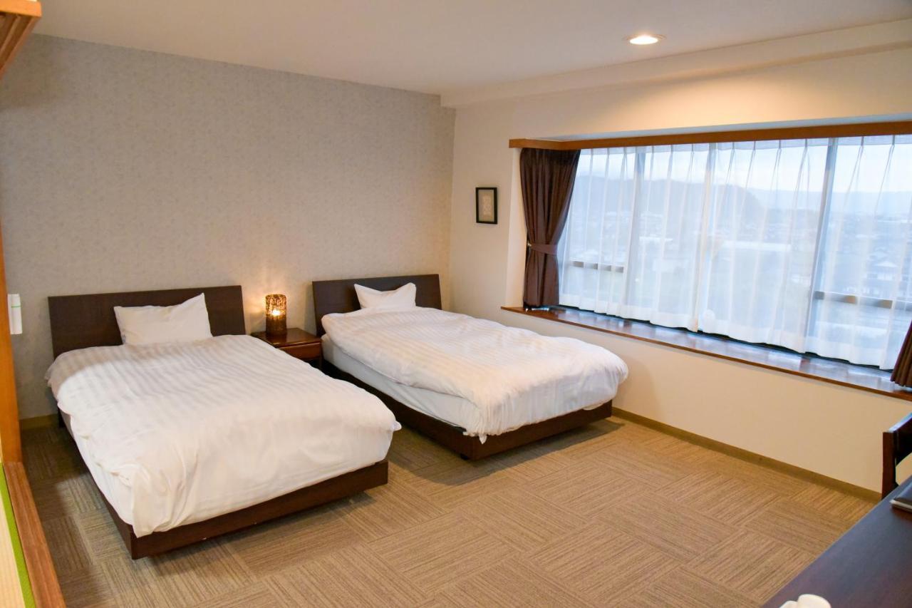 Aso Hotel Bagian luar foto