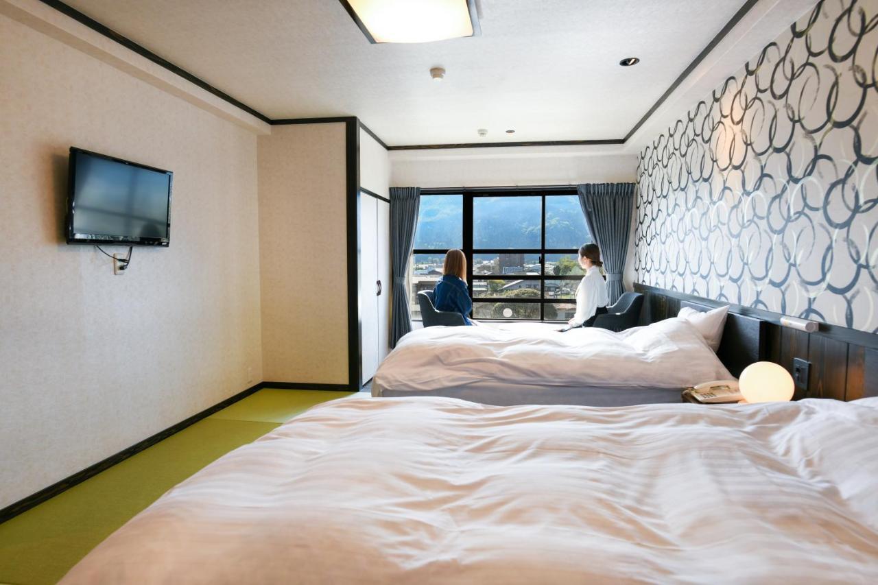 Aso Hotel Bagian luar foto