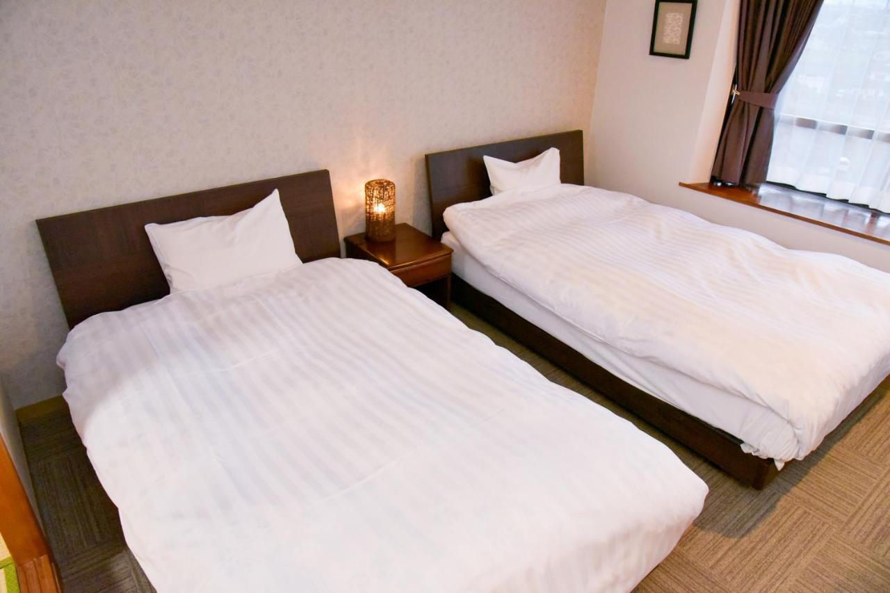 Aso Hotel Bagian luar foto
