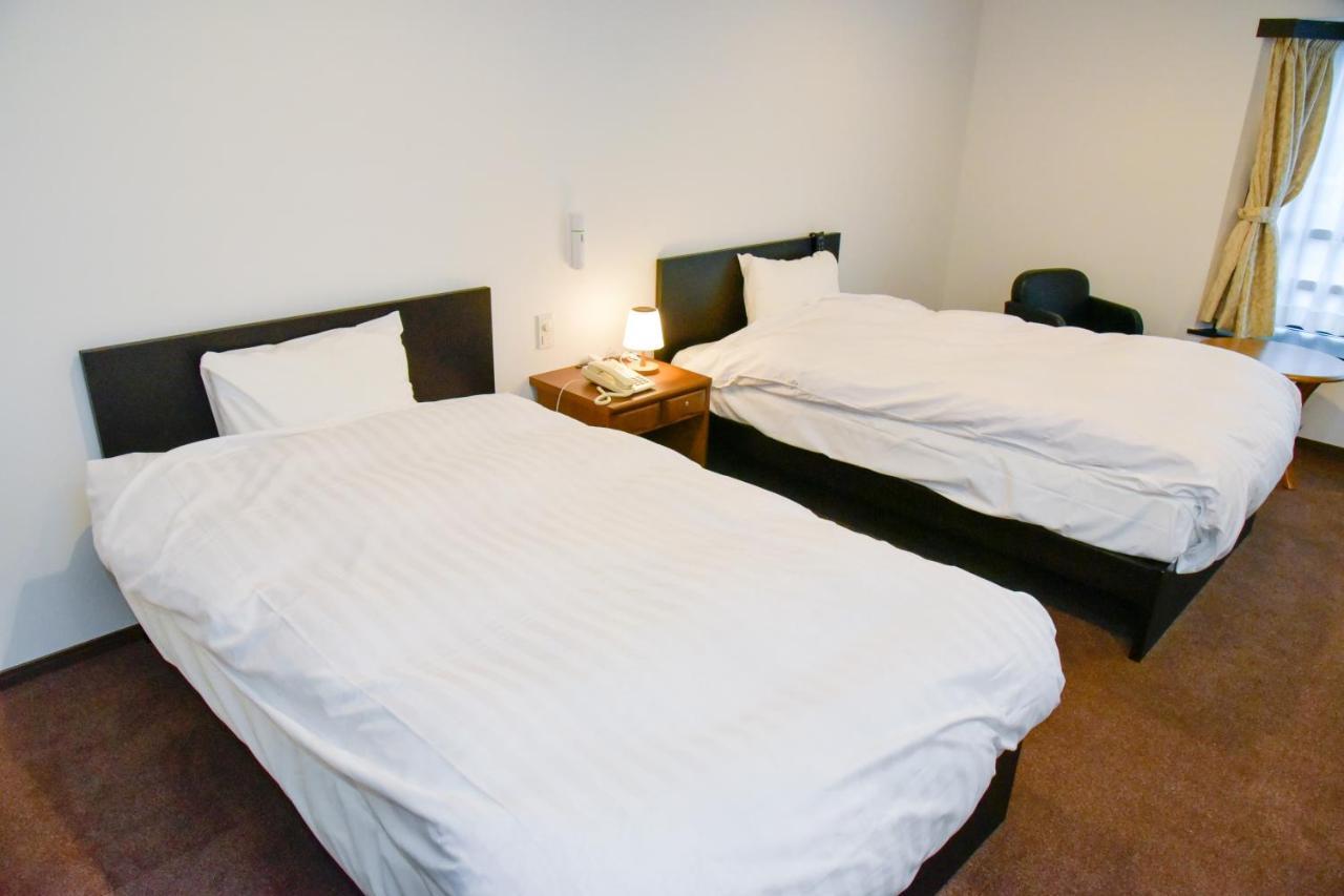 Aso Hotel Bagian luar foto