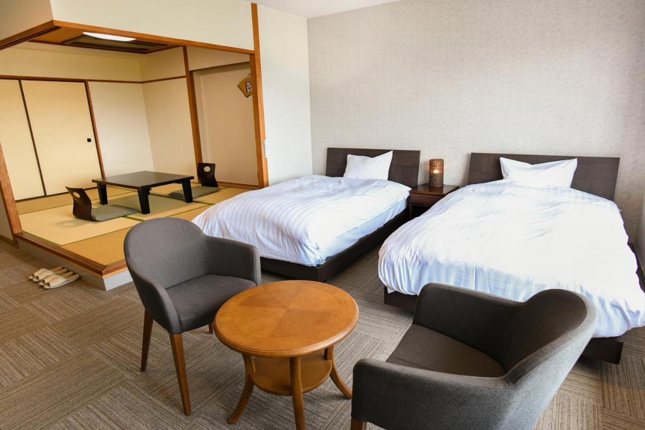 Aso Hotel Bagian luar foto
