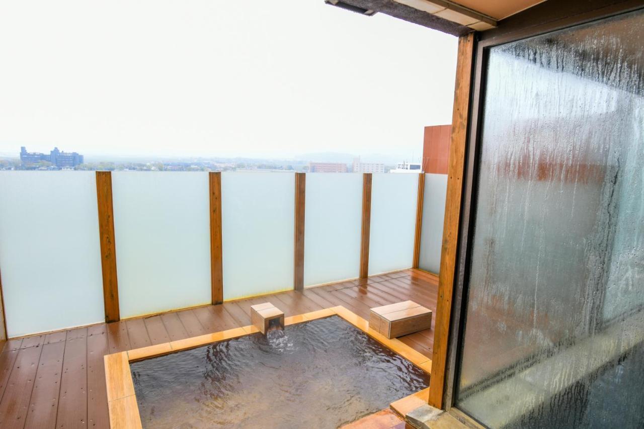Aso Hotel Bagian luar foto