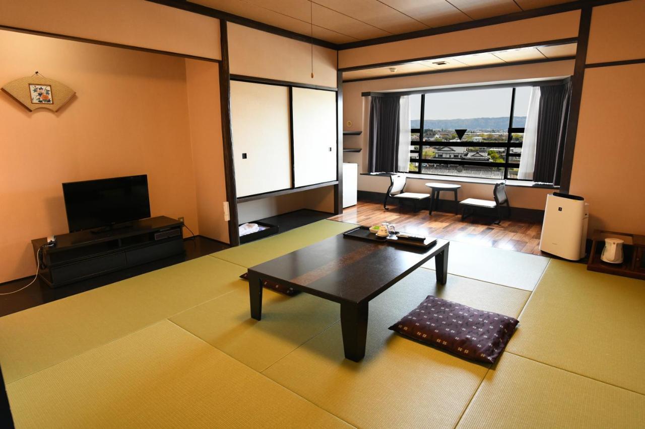 Aso Hotel Bagian luar foto