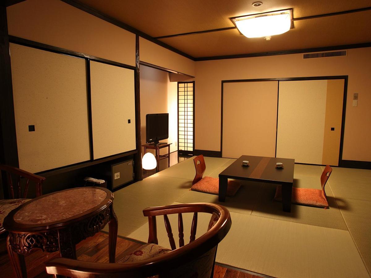 Aso Hotel Bagian luar foto