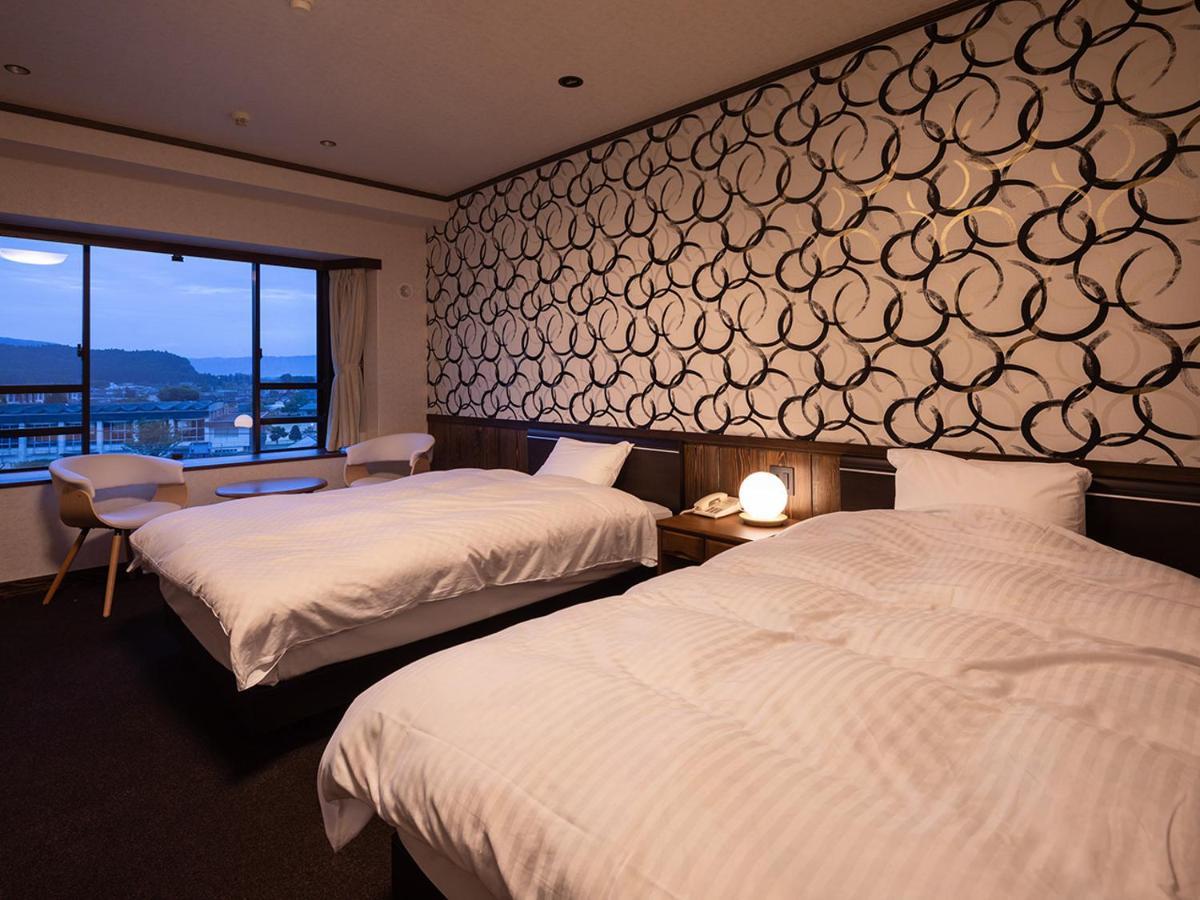 Aso Hotel Bagian luar foto